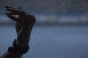 Latin student hand at window